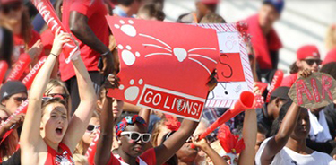 Fans cheering at a York U sports game